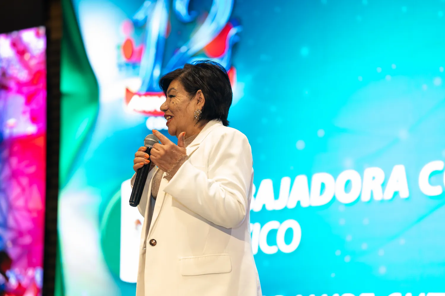 DXN – momento destacado del evento – fotografía corporativa en Bogotá