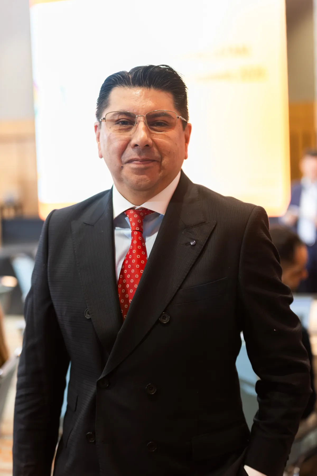 Illumina Latam Summit 2026 – asistentes en el salón – fotografía corporativa en Colombia